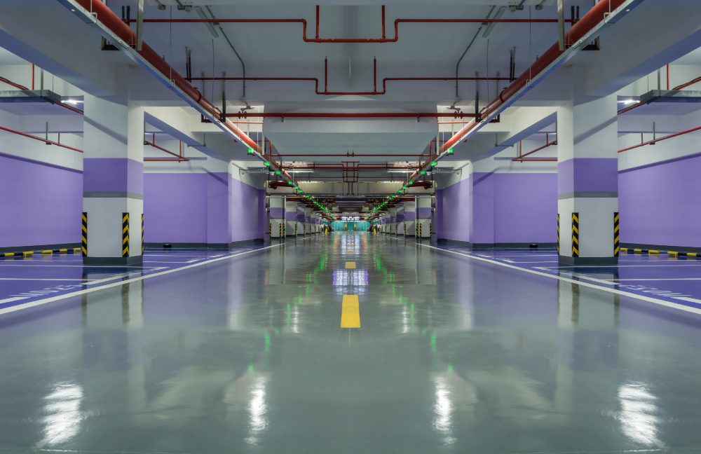 An industrial space with a newly coated floor.